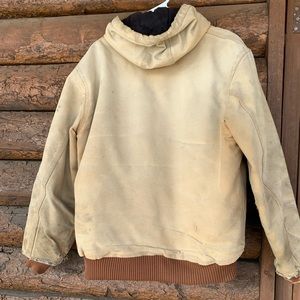 Well worn rugged Carhartt coat